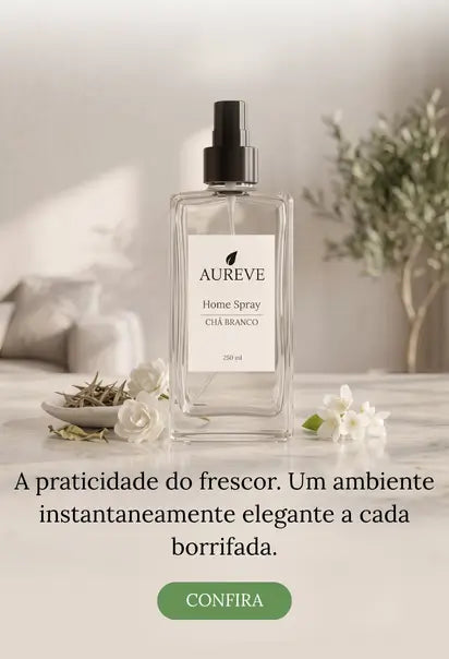 Banner da Aureve com o Home Spray Chá Branco 250ml sobre bancada de mármore, decorado com flores brancas e folhas de chá. Texto na imagem: 'A praticidade do frescor. Um ambiente instantaneamente elegante a cada borrifada.' junto a um botão de 'Confira'